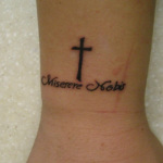 cross wrist tattoos for guys